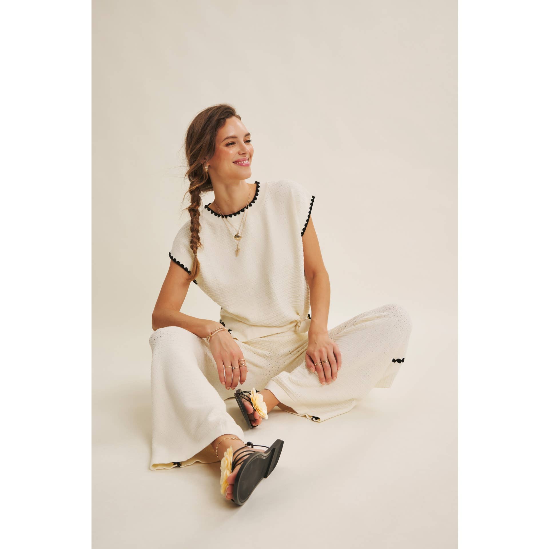 PLAYFUL SOPHISTICATION BEACHY TEXTURED SWEATER PANTS: IVORY / S | Stella & Grace Boutique .