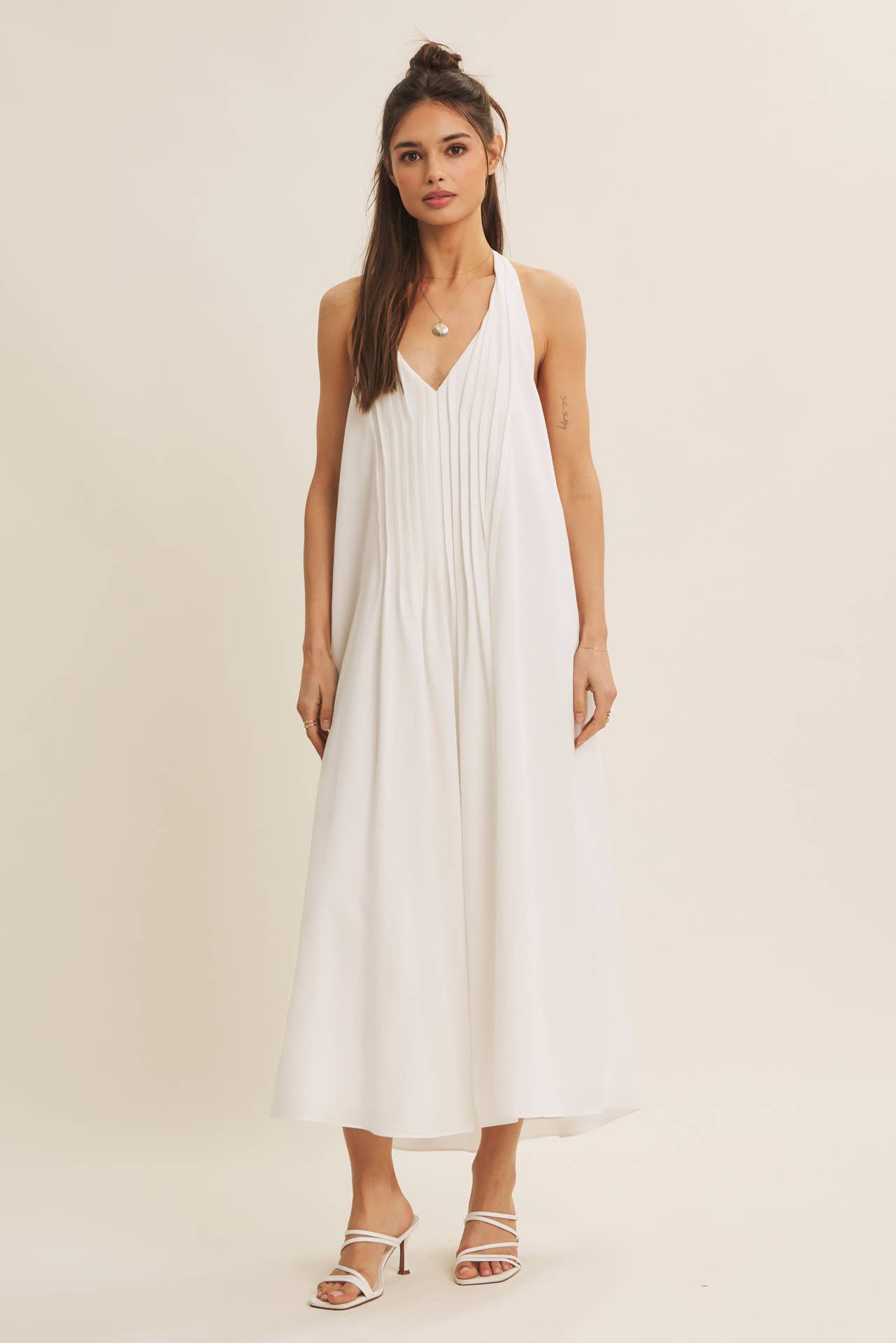 SOFTLY FLOWING PLEATED ELEGANCE HALTER MIDI DRESS: OFF WHITE / S | Stella & Grace Boutique .