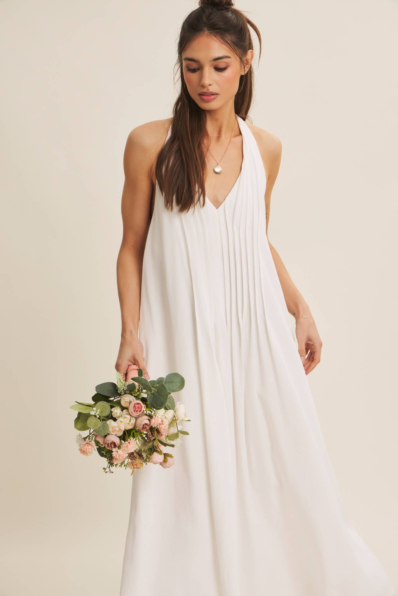 SOFTLY FLOWING PLEATED ELEGANCE HALTER MIDI DRESS: OFF WHITE / S | Stella & Grace Boutique .