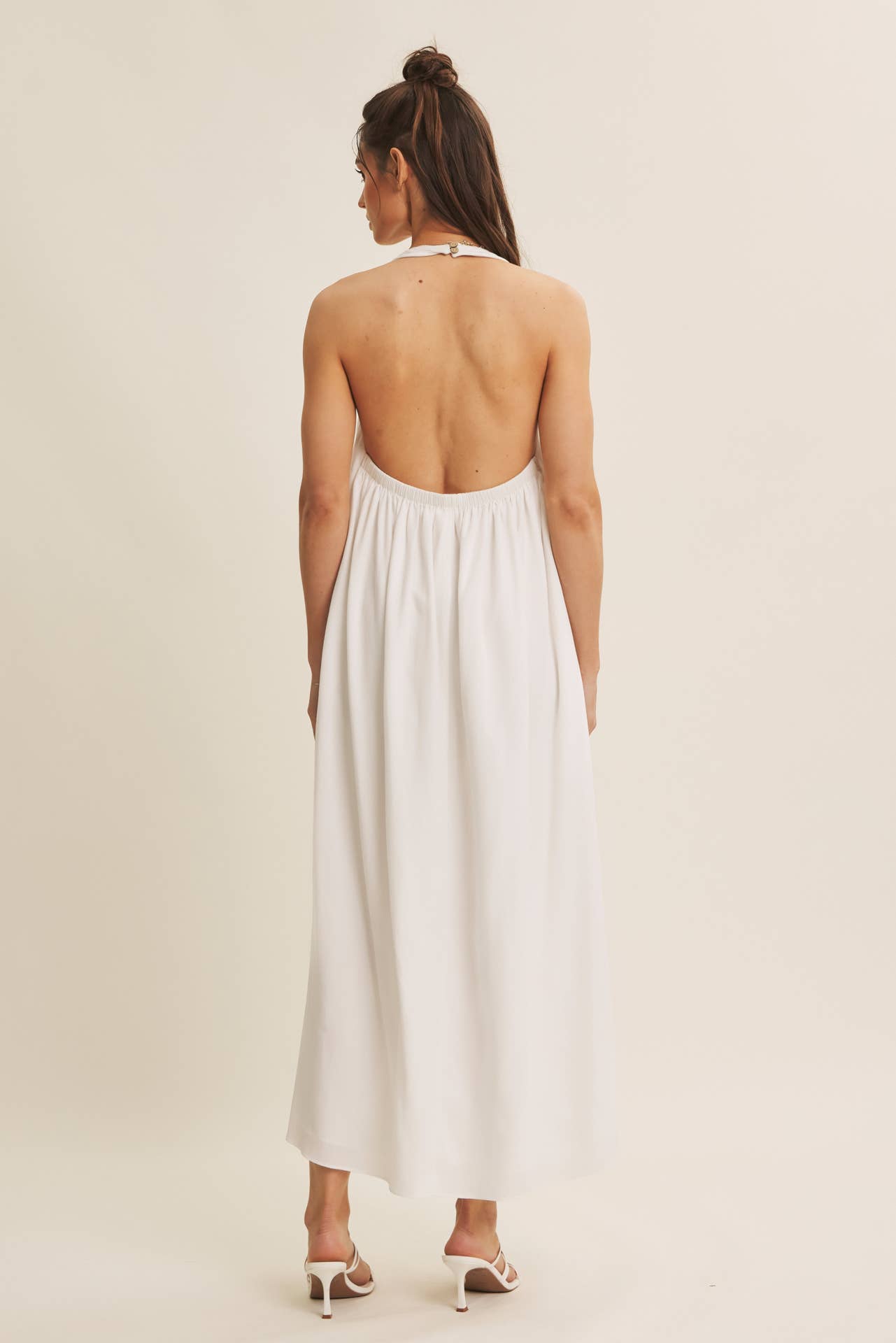 SOFTLY FLOWING PLEATED ELEGANCE HALTER MIDI DRESS: OFF WHITE / S | Stella & Grace Boutique .