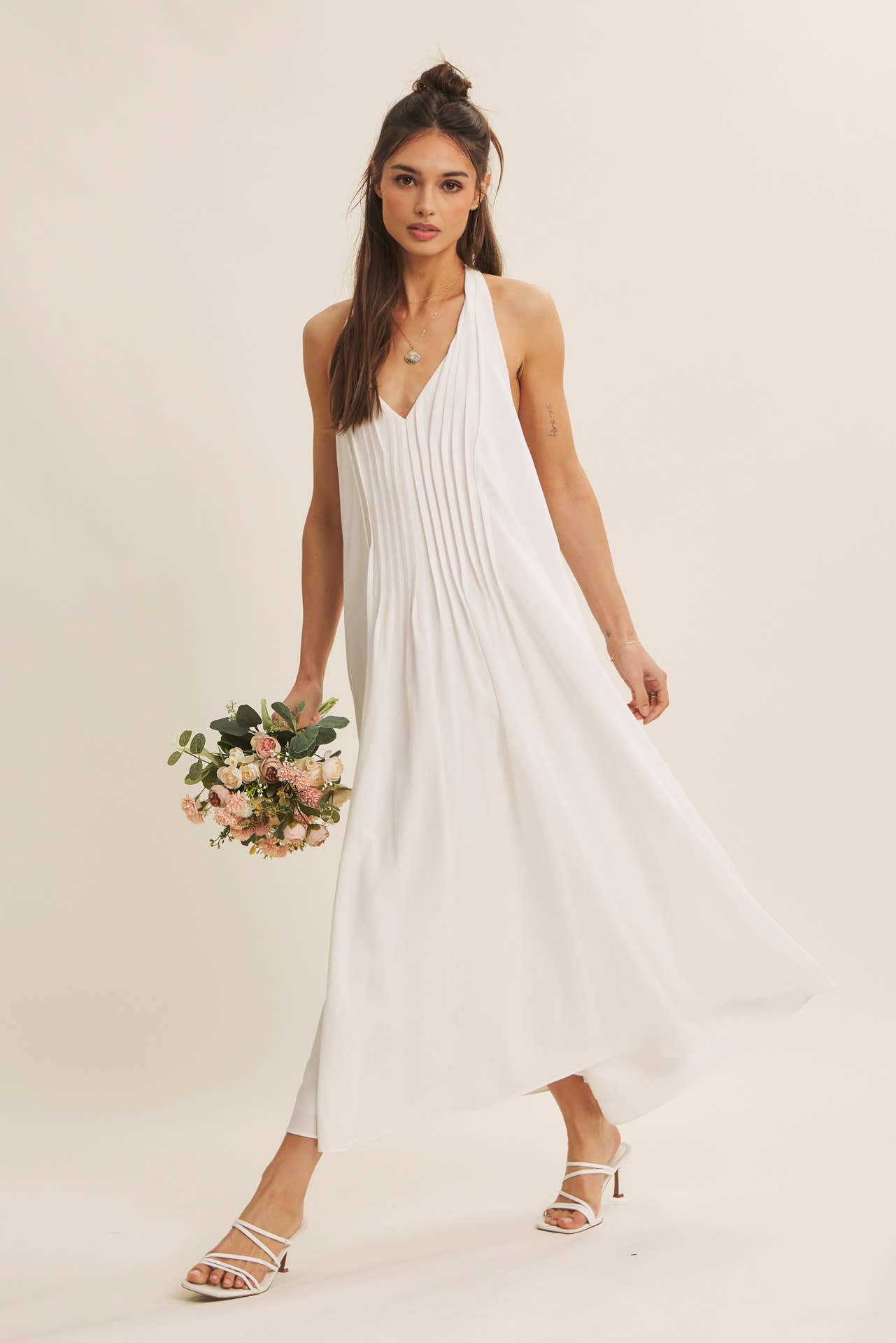 SOFTLY FLOWING PLEATED ELEGANCE HALTER MIDI DRESS: OFF WHITE / S | Stella & Grace Boutique .