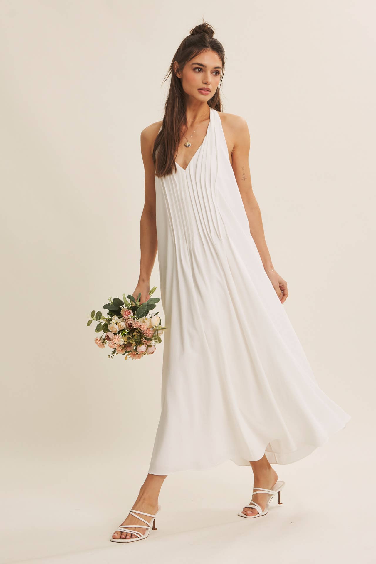 SOFTLY FLOWING PLEATED ELEGANCE HALTER MIDI DRESS: OFF WHITE / S | Stella & Grace Boutique .