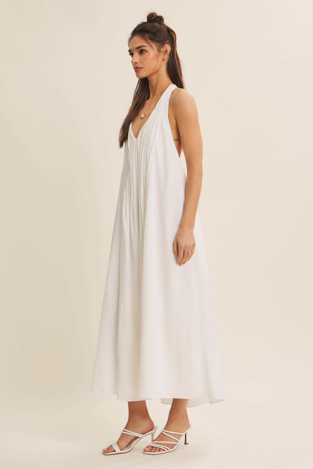 SOFTLY FLOWING PLEATED ELEGANCE HALTER MIDI DRESS: OFF WHITE / S | Stella & Grace Boutique .