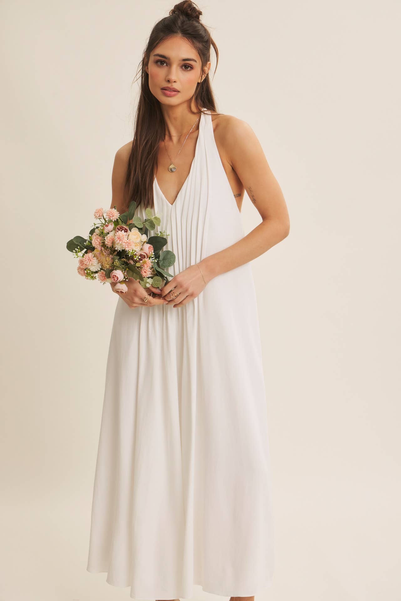 SOFTLY FLOWING PLEATED ELEGANCE HALTER MIDI DRESS: OFF WHITE / S | Stella & Grace Boutique .